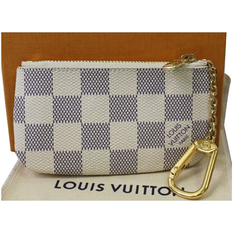 white louis vuitton coin purse.